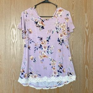 Light purple floral top with white lace bottom and cut-out accent on back